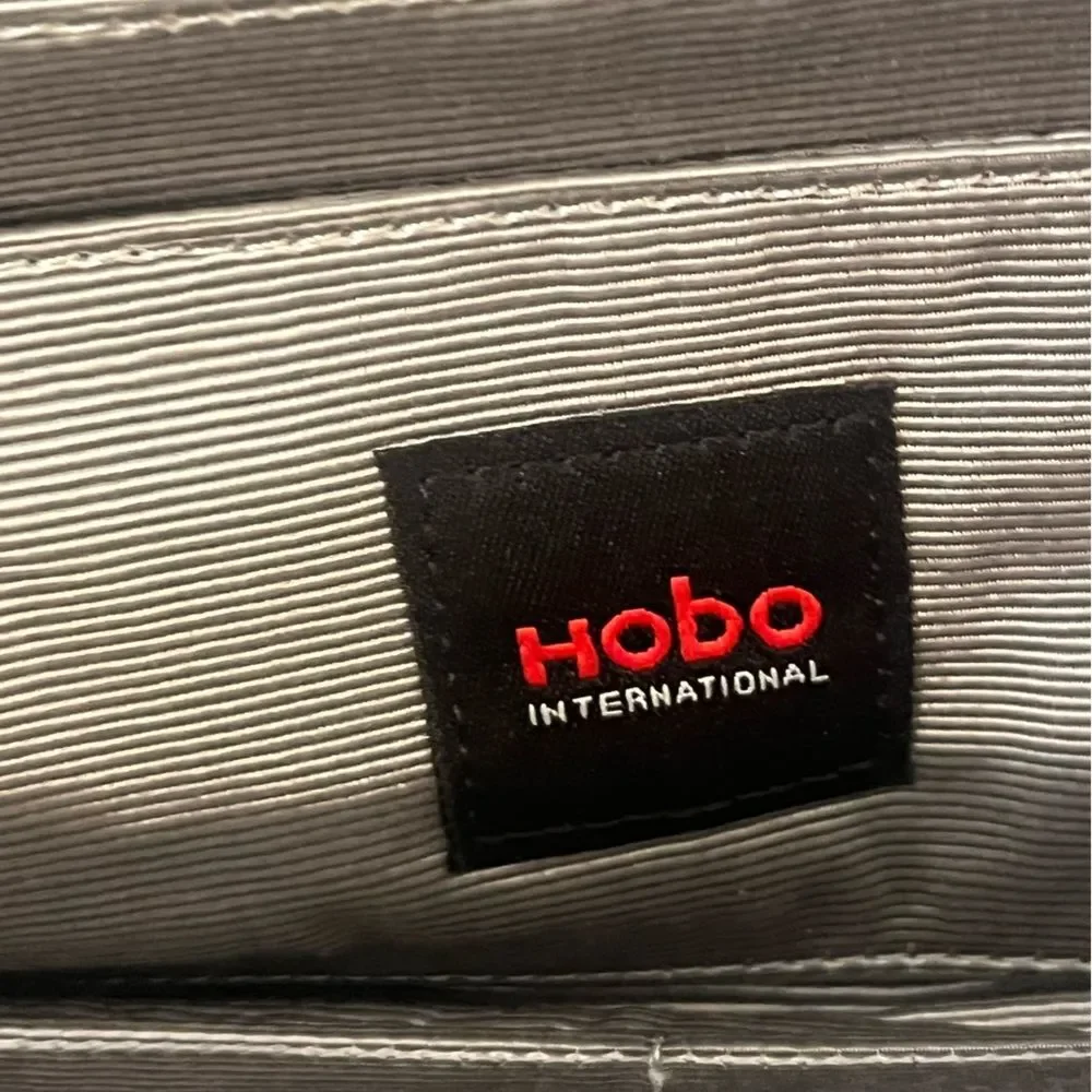 HOBO patent leather clutch wallet, garnet ombré jewel‎ tone colors to pink.